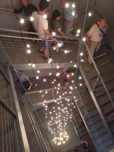 A light installation by Felix Gonzales Torres activates the stairwell.